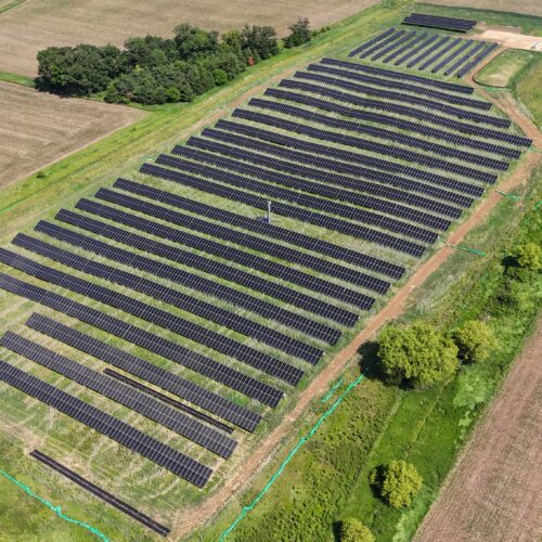Aerial view of full UW Kegonsa Solar Array surrounded by farmland and research buildings