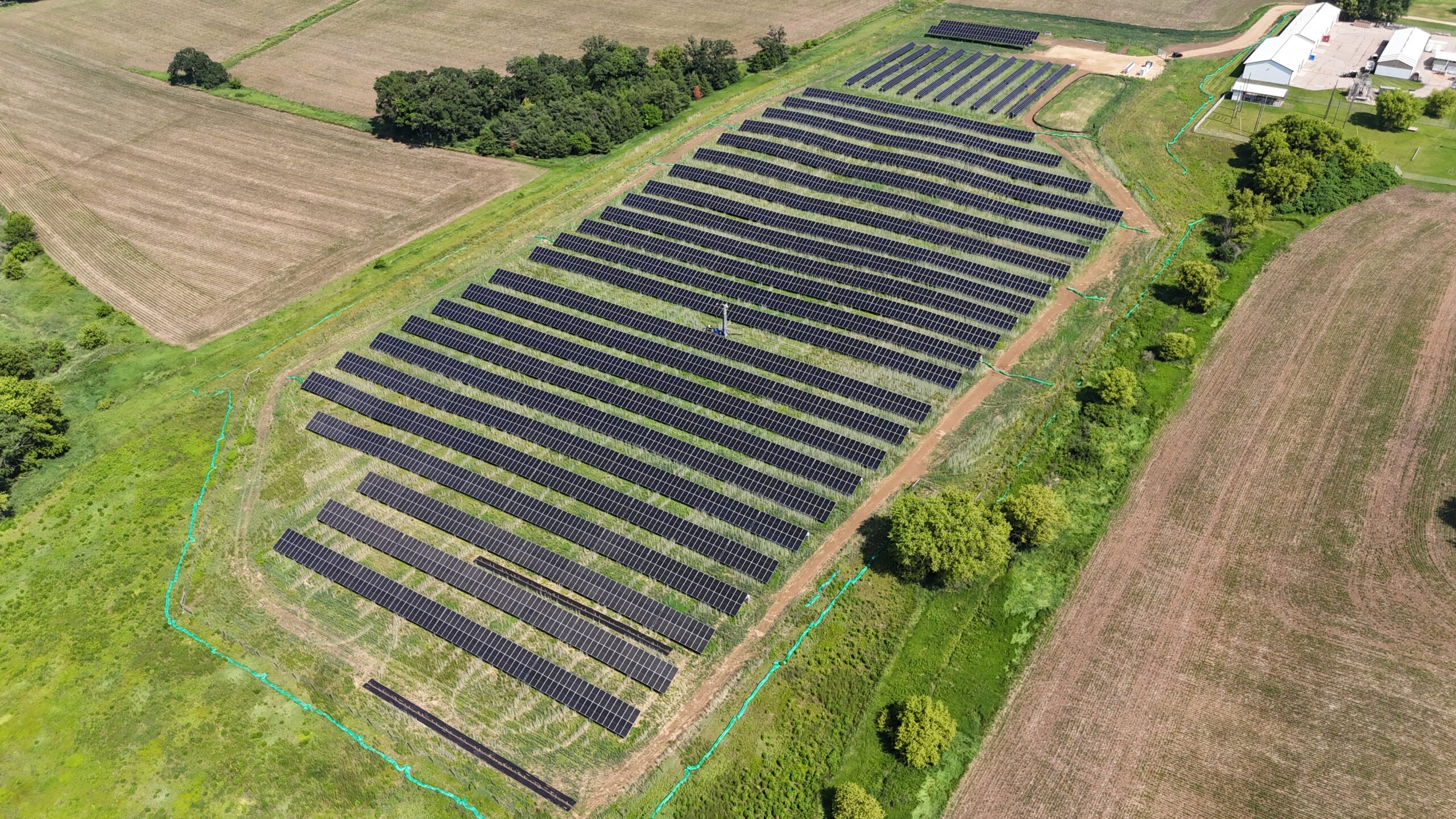 Aerial view of full UW Kegonsa Solar Array surrounded by farmland and research buildings